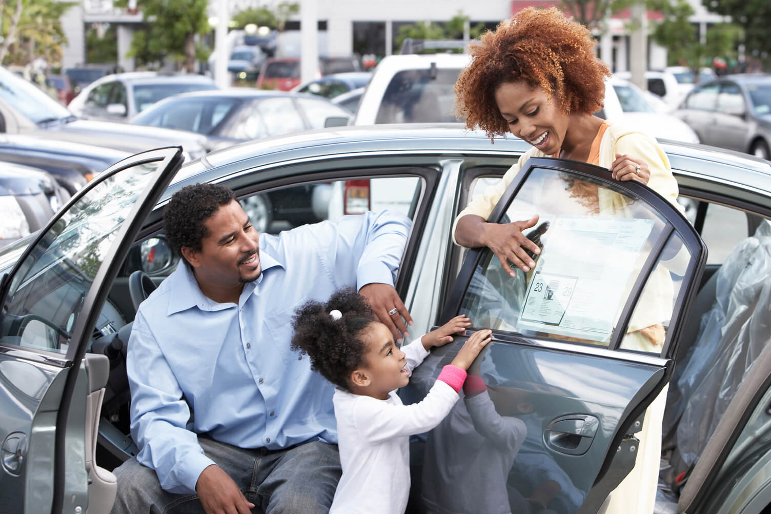 a happy family in a car