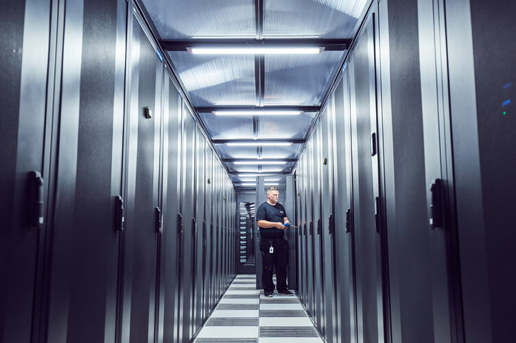 Man in a data centre 